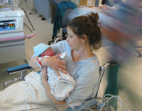 Eli with mom in NICU